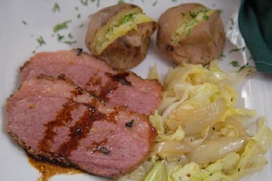 Baked Corned Beef with Sauteed Cabbage and Baked New Potatoes